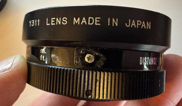 Two Yashica lenses in case