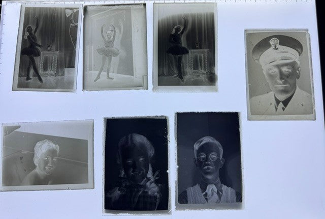 Seven vintage glass plate negatives