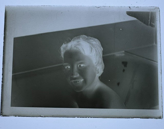 Seven vintage glass plate negatives