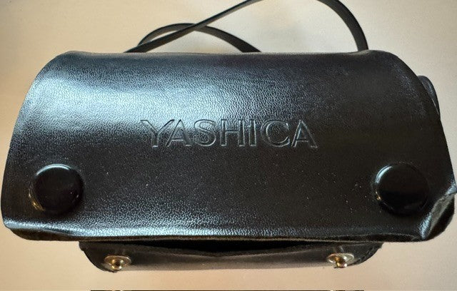 Two Yashica lenses in case