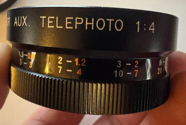 Two Yashica lenses in case