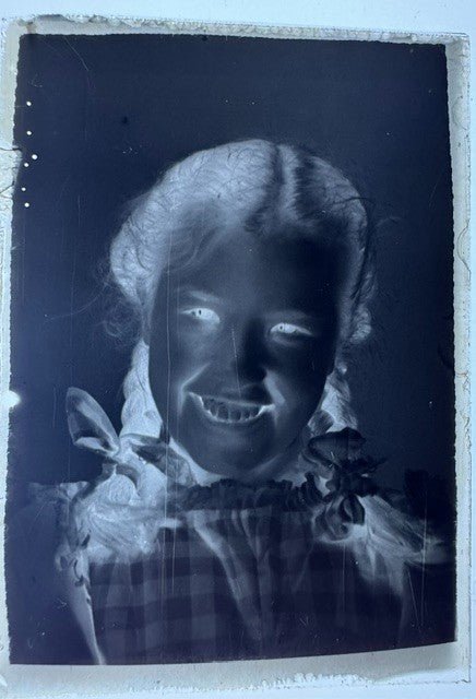 Seven vintage glass plate negatives
