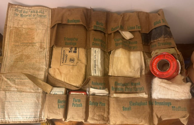 Vintage mid century car first aid kit