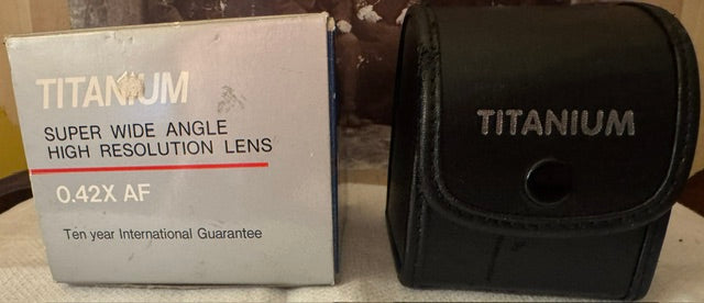 Titanium Super Wide Angle 0.42x AF Lens — Leather Case, Two Adapter Rings, Original Box & Instructions